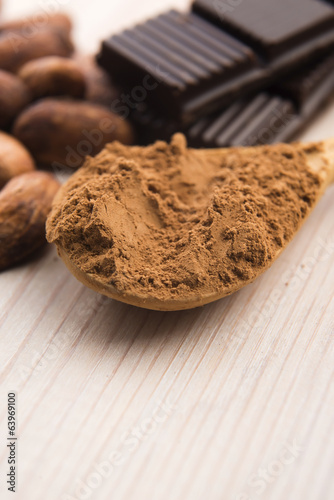 Photo: Cocoa (cacao) beans with chocolate Cocoa (cacao) beans with chocolate