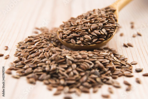 Photo: Wooden spoon with flax seed Wooden spoon with flax seed