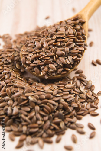 Photo: Wooden spoon with flax seed Wooden spoon with flax seed