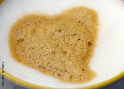 Photo: Closeup cappuccino with heart Closeup cappuccino with heart