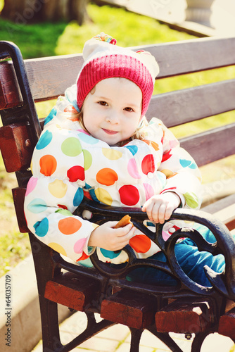 Photo: toddler girl on the bench toddler girl on the bench