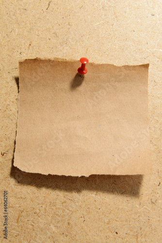 Photo: Empty paper sheet on wooden background Empty paper sheet on wooden background