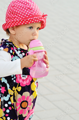 Photo: baby girl drinking water baby girl drinking water