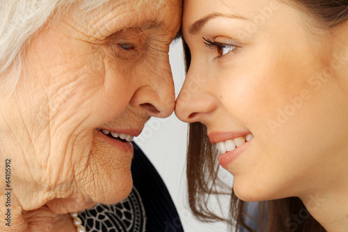 Photo: Elderly woman with granddaughter Elderly woman with granddaughter
