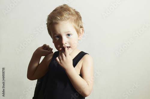 Photo: fashionable little boy.fashion children.handsome blond kid fashionable little boy.fashion children.handsome blond kid