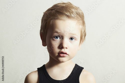 Photo: Child. Funny Little Boy. Handsome Boy with Blue Eyes Child. Funny Little Boy. Handsome Boy with Blue Eyes