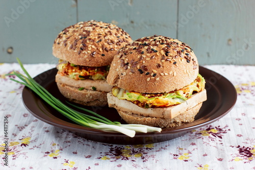 Photo: Vegetarian burgers with wholegrain buns, tofu and vegetables Vegetarian burgers with wholegrain buns, tofu and vegetables