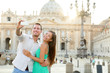 Tourists couple by Vatican city in Rome Tourists couple by Vatican city in Rome