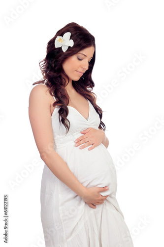 Photo: Lovely pregnant woman with a beautiful dress Lovely pregnant woman with a beautiful dress