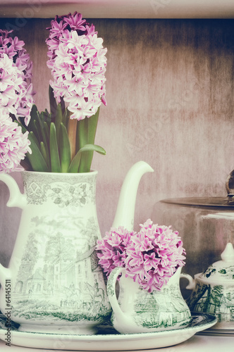 Photo: Retro setting with pink hyacinths Retro setting with pink hyacinths
