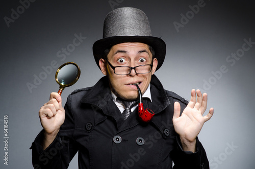 Photo: Funny detective with pipe and hat Funny detective with pipe and hat