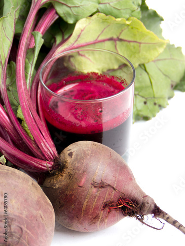 Photo: Fresh juice of red beets on white Fresh juice of red beets on white