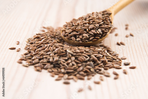 Photo: Wooden spoon with flax seed Wooden spoon with flax seed