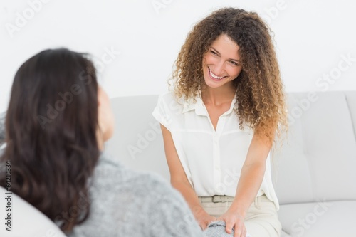 Photo: Therapist smiling at her patient Therapist smiling at her patient