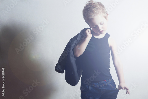 Photo: fashionable little boy.fashion children. Child fashionable little boy.fashion children. Child