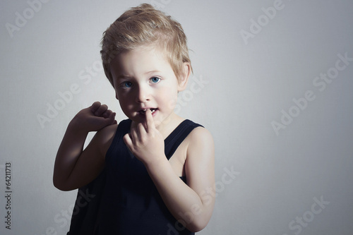 Photo: fashionable little boy.handsome blond kid fashionable little boy.handsome blond kid