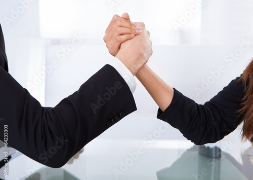 Photo: Business Colleagues Arm Wrestling Business Colleagues Arm Wrestling