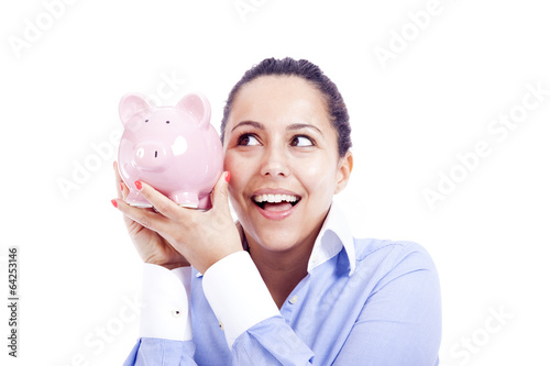 Photo: Happy business woman with piggy bank, isolated on white Happy business woman with piggy bank, isolated on white