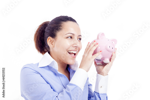 Photo: Happy business woman with piggy bank, isolated on white Happy business woman with piggy bank, isolated on white
