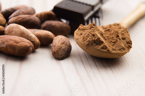 Photo: Cocoa (cacao) beans with chocolate Cocoa (cacao) beans with chocolate