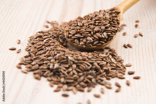 Photo: Wooden spoon with flax seed Wooden spoon with flax seed