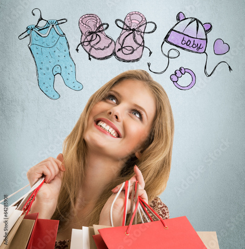 Photo: Woman planning purchases newborn baby Woman planning purchases newborn baby