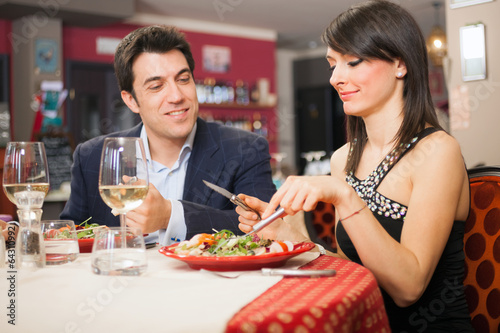Photo: Couple having dinner in a restaurant Couple having dinner in a restaurant
