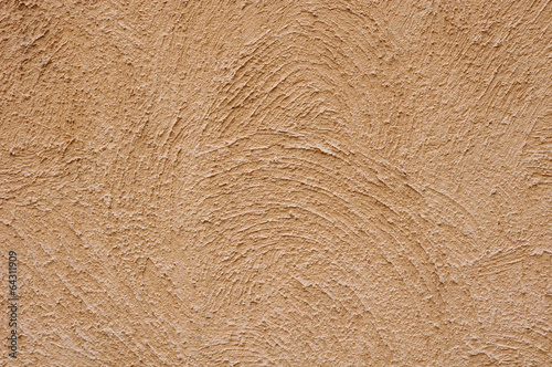 Photo: Orange rough plaster on wall Orange rough plaster on wall