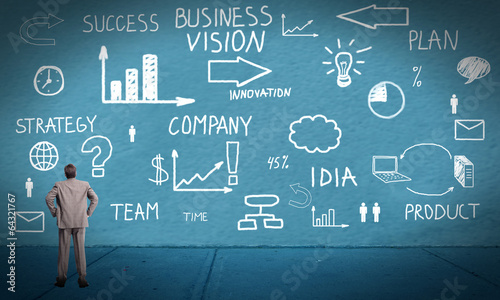 Photo: Businessman looking at Innovation plan. Businessman looking at Innovation plan.