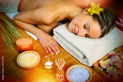 Photo: Beautiful woman having massage. Beautiful woman having massage.