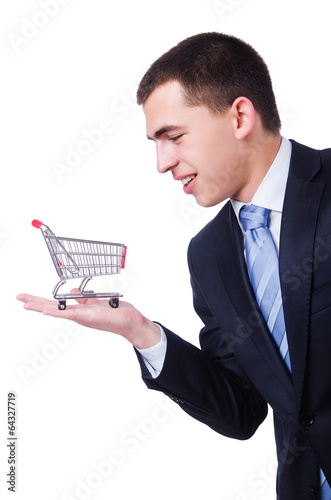 Photo: Businessman with shopping cart on white Businessman with shopping cart on white