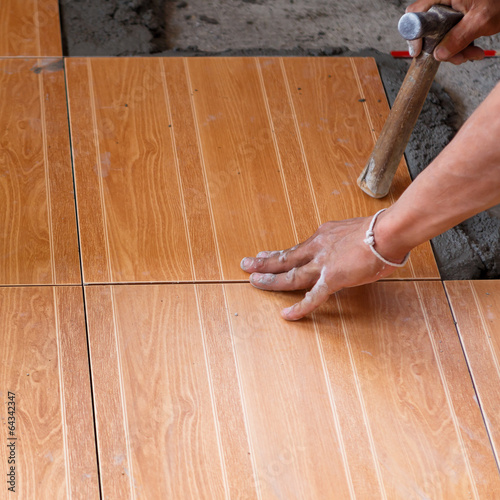 Photo: floor tile installation for house building floor tile installation for house building