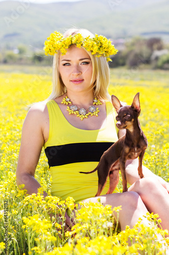 Photo: Pretty girl on the nature with her dog Pretty girl on the nature with her dog