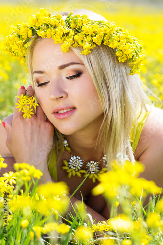 Photo: Young beautiful girl in the yellow field Young beautiful girl in the yellow field