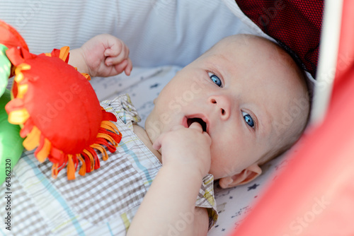 Photo: baby with fingers in mouth baby with fingers in mouth