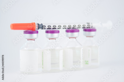 Photo: Injection vial and disposable syringe Injection vial and disposable syringe