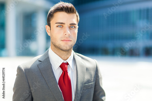Photo: Very handsome businessman in an urban setting Very handsome businessman in an urban setting