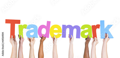 Photo: Multiethnic Group of Hands Holding Trademark Multiethnic Group of Hands Holding Trademark
