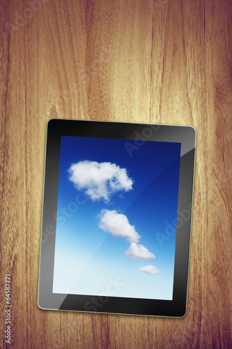 Photo: cloud tablet on desk cloud tablet on desk