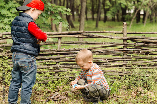 Photo: Two young boys playing with matches Two young boys playing with matches