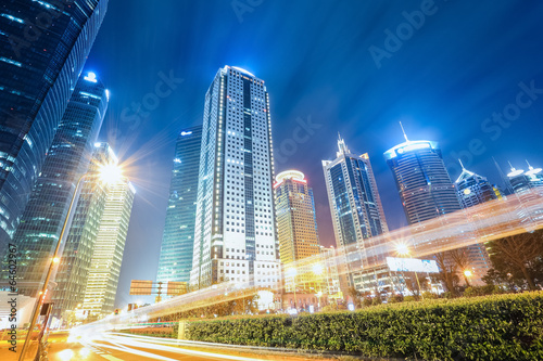 Photo: futuristic urban buildings at night futuristic urban buildings at night