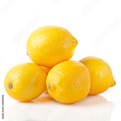 Photo: ripe lemons on a white background ripe lemons on a white background