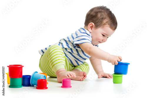Photo: baby boy playing with cup toys baby boy playing with cup toys