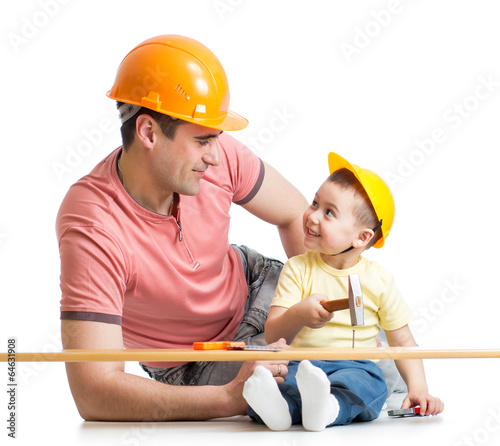 Photo: Father and son working together Father and son working together