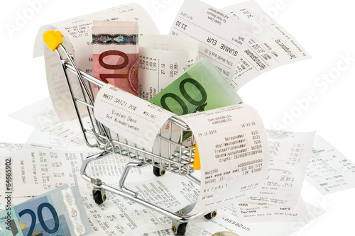 Photo: shopping cart, receipts and money shopping cart, receipts and money