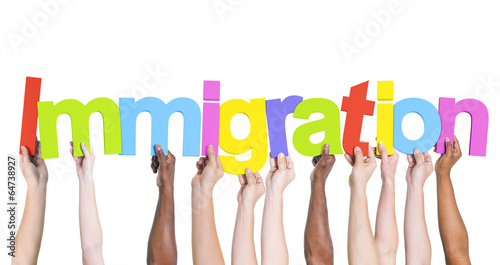 Photo: Diverse Hands Holding the Word Immigration Diverse Hands Holding the Word Immigration