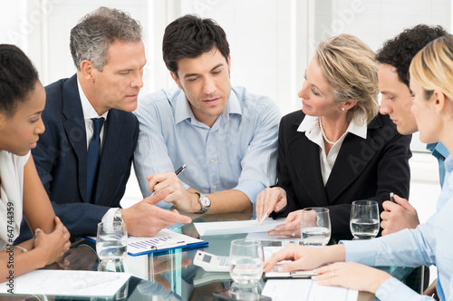Photo: Working Together At Office Working Together At Office