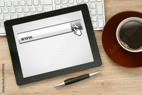 Photo: Tablet PC on Table with Websearch Tablet PC on Table with Websearch