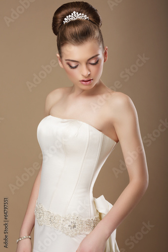 Photo: Luxury. Gorgeous Woman with Shiny Diadem Daydreaming Luxury. Gorgeous Woman with Shiny Diadem Daydreaming