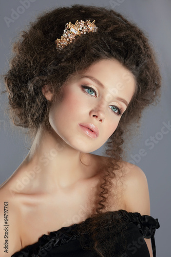 Photo: Dreamy Gentle Serene with Frizzy Brown Hair and Golden Brooch Dreamy Gentle Serene with Frizzy Brown Hair and Golden Brooch